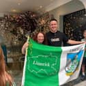 Limerick hurler Darragh O'Donovan reunites with famous flag and it's owner, Kathleen Delaney. PICTURE: Facebook