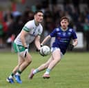 Killoe Emmet Óg's Ronan Keogh prepares to give a handpass as Rathcline's Oran Kenny attempts to close him down during Saturday's Peter Hanley Motors Longford Senior Football Championship encounter in Ballymahon 