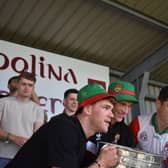Jordan Flynn, Kobe McDonald and Conor Loftus lifting the Sam Maguire trophy at homecoming in Crossmolina