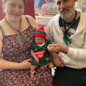 Proud parents Cecelia and Damian Birrane, from Ballina, with their newborn daughter, Eve Samantha, wearing a Mayo jersey.