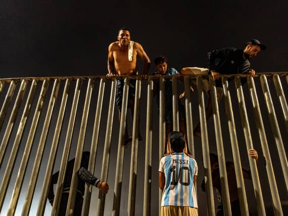 Migrants try to cross from Morocco into the Spanish enclave of Ceuta