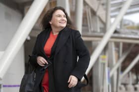MSP Katy Clark walks into the Scottish Parliament