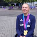 Scottish para-athlete Melanie Woods smiles at the camera