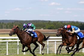 Enfjaar (left) makes all the running for Ray Dawson