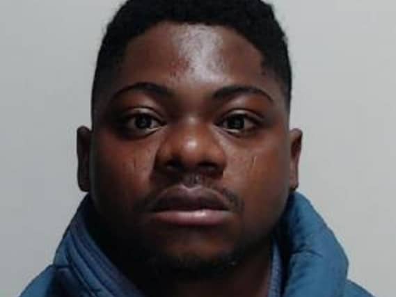Handout mugshot of Osarenkhoe Atutie