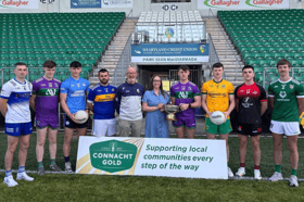   Niamh Jinks of Connacht Gold alongside Leitrim GAA Chairperson Declan Bohan and our Senior Clubs  