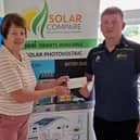 Anthony Holohan, Managing Director Solar Compare, presenting Sponsorship Cheque to Patricia Griffin, Secretary of Ballinamore Athletic Club