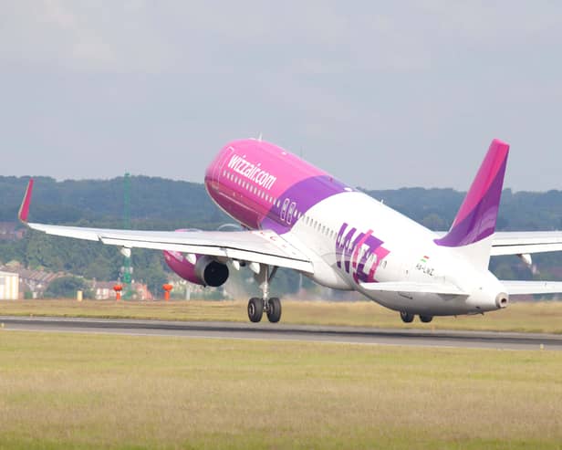 A Wizz Air plane taking off