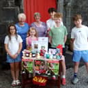 Hazel Dickinson (back row, 1st left) and Heather Sherman (back row, middle) with some of the youngsters of Kilkenny Union of Church of Ireland parishes 