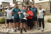 Sam Maguire Cup visits The Mayo Roscommon Hospice From left: Cillian O'Connor, Aidan O'Shea, Jack Coyne, CEO of Mayo Roscommon Hospice Martina Jennings, Matthew Ruane and Mayo team manager Andy Moran. Pic: Conor McKeown