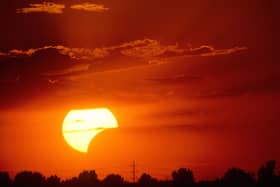 Partial solar eclipse at sunset