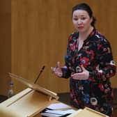 Monica Lennon standing while speaking in Holyrood