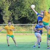 Battling for the kickout during Friday's Connacht Gold Leitrim SFC clash between Aughawillan and Ballinamore Sean O'Heslins Picture: Willie Donnellan