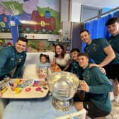  Katie, photographed during her stay in MUH, with Sam Maguire and Fergal Boland, Jack Coyne, Cian McHale, Diarmuid O’Connor and Bob Tuohy.