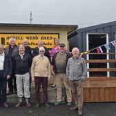 Brian McEnery, husband of President Connolly with members of Achill Men's Shed while on holidays in Achill