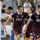 Hearts’ Tomas Magnusson (left) celebrates with Jordi Altena