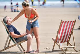 Sunscreen being applied