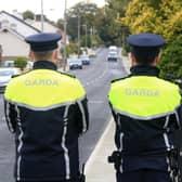 Two gardai standing stock image