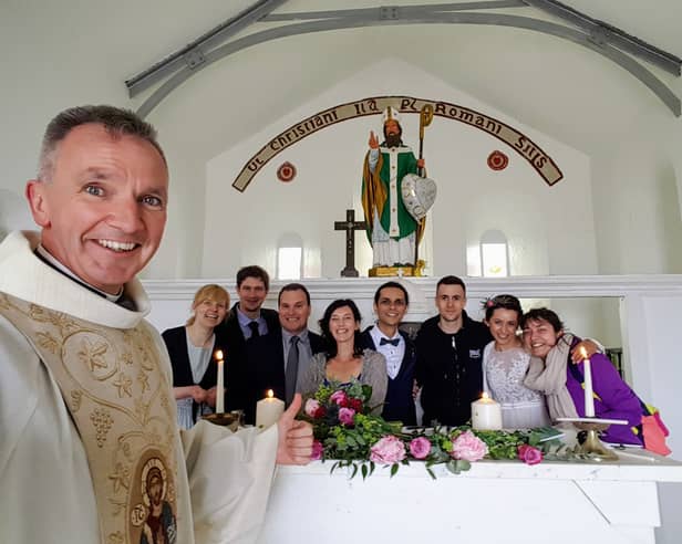 EXTRA SPECIAL OCCASION: Fr John Kenny pictured after performing a wedding ceremony in the church on the summit of Croagh Patrick.