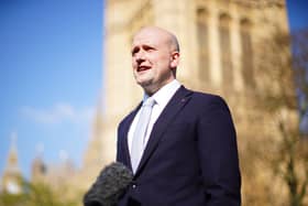 Stephen Flynn speaking to the media outside the Houses of Parliament