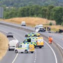 Gardaí and emergency personnel at the scene of the incident on the M9 