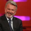 Sam Neill smiling on The Graham Norton Show