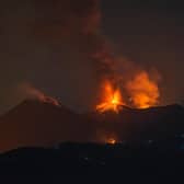 Eruptive activity continues on Mount Etna, where lava flows continue to descend on the slopes of the volcano, as seen from Mareneve near Catania, Italy