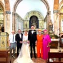 Gearóid and Niamh with family inside the chapel as the celebrated their nuptials