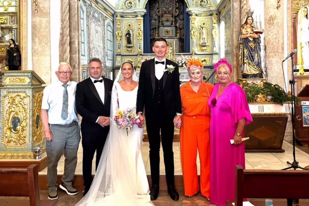 Gearóid and Niamh with family inside the chapel as the celebrated their nuptials