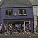 The walkers on the final stretch to Semple Stadium
