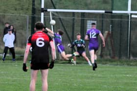 Leitrim Gaels' Liam Chandler makes a diving block on the shot of Fenagh St Caillins' Conal McGovern (hidden) in added time on Friday Picture: Willie Donnellan