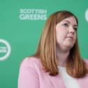 Gillian Mackay, in front of Scottish Green signage