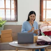 A person selling clothes online