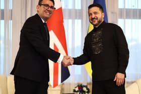Andy Burnham shakes hands with Volodymyr Zelensky
