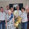 Bob Savage with his family at his 100th birthday celebration. From left, his son Andrew, Doug Drummond, Tanya Barry, his son Christopher, Ute Doerge-Baischew and Melanie Griffith