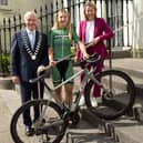 At the launch of Rás na mBan in Carrick-on-Suir were, from left, Cllr. Kieran Bourke, Cathaoirleach Carrick-on-Suir Municipal District, international cyclist Aoife O'Donovan and Valerie Considine, Race Director Rás na mBan
