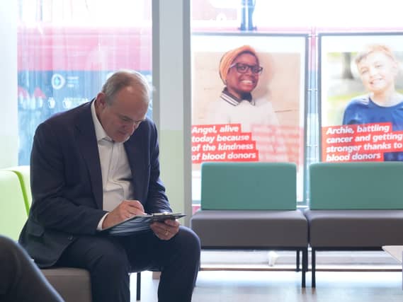 Sir Ed Davey donates blood