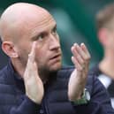 Manager David Gray applauds the Hibernian fans