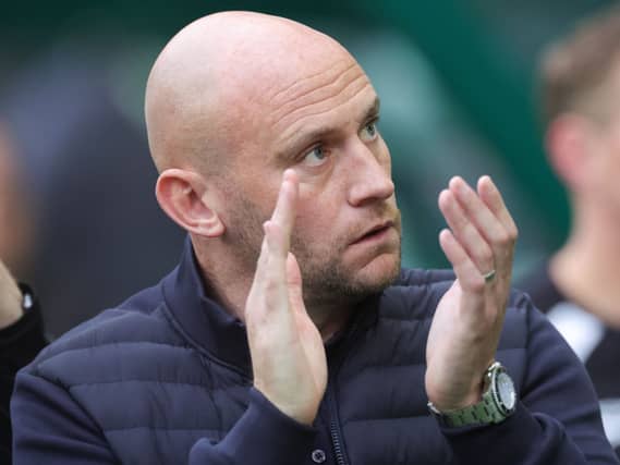 Manager David Gray applauds the Hibernian fans