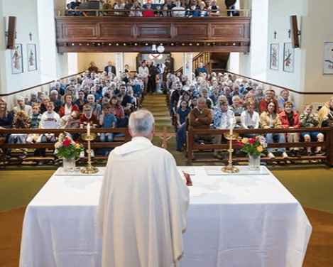 Fr O'Rourke celebrating his final mass at the Parish