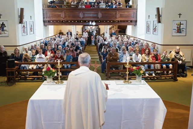 Fr O'Rourke celebrating his final mass at the Parish