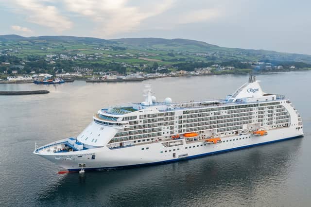 Seven Seas Voyager anchored off Greencastle last Friday morning, shortly before the deceased passenger was removed from the ship.