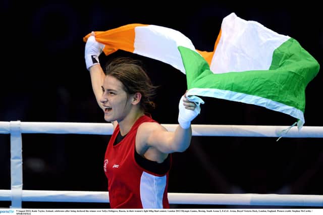 9 August 2012; Katie Taylor celebrates after being declared the winner over Sofya Ochigava in their women's light 60kg final contest. London 2012 Olympic Games.