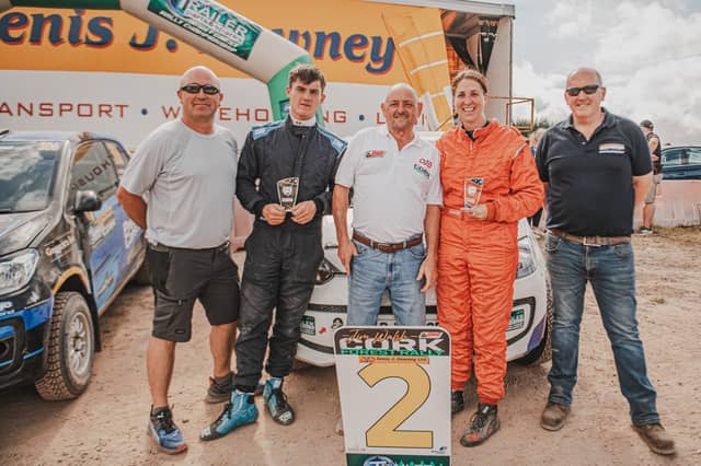 Daniel Ormond (in black, second from left) with John Quill, Irish Forest Rally Championship Manager; Sean Daly, Cork Motor Club; Mairead Duane, and Leonard Downey at the finish of the recent Jim Walsh Cork Forest Rally.