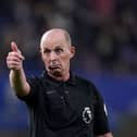 Mike Dean refereeing in the Premier League.