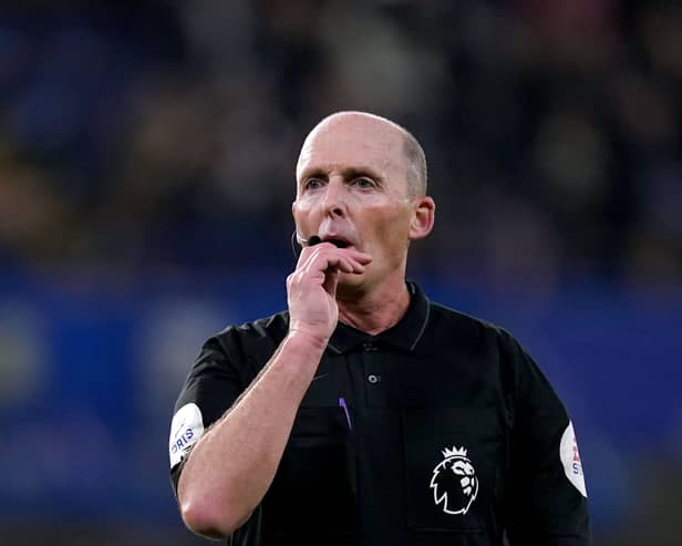 Referee Mike Dean pictured officiating a Chelsea v Brighton match