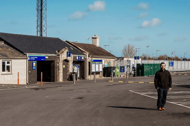 Social Democrats Cllr Chris Pender standing outside Newbridge Train Station