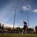 A person competes in weight tossing category during the Braemar Gathering highland games