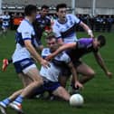 Leitrim Gael's Jack Flynn battles with St Mary's Conor Farrell and Oisin Bohan for possession Picture: Willie Donnellan