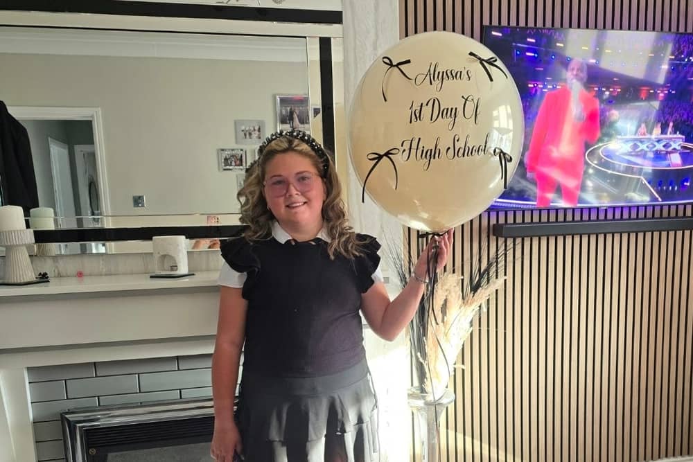 Alyssa holding a balloon